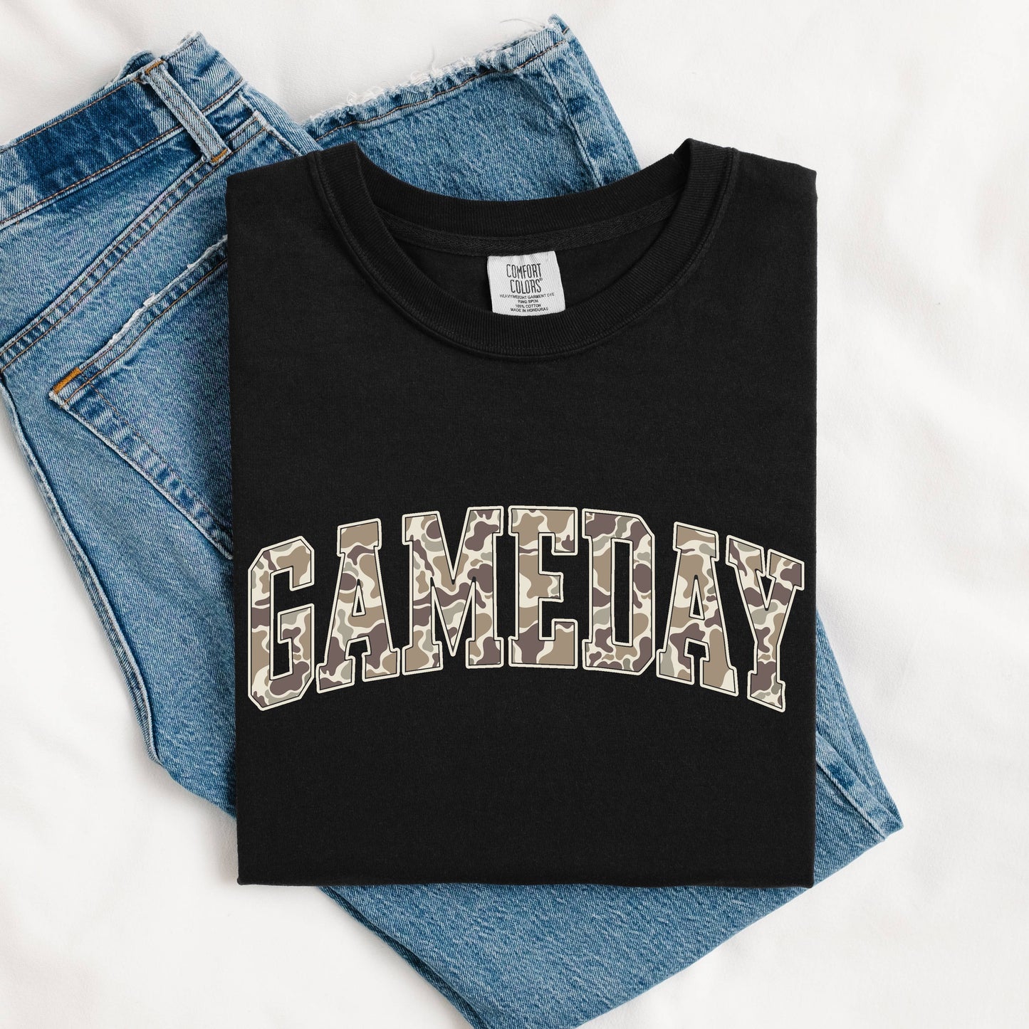 Black t-shirt with Camo Crunch Game Day Tee 'GAMEDAY' print on blue jeans