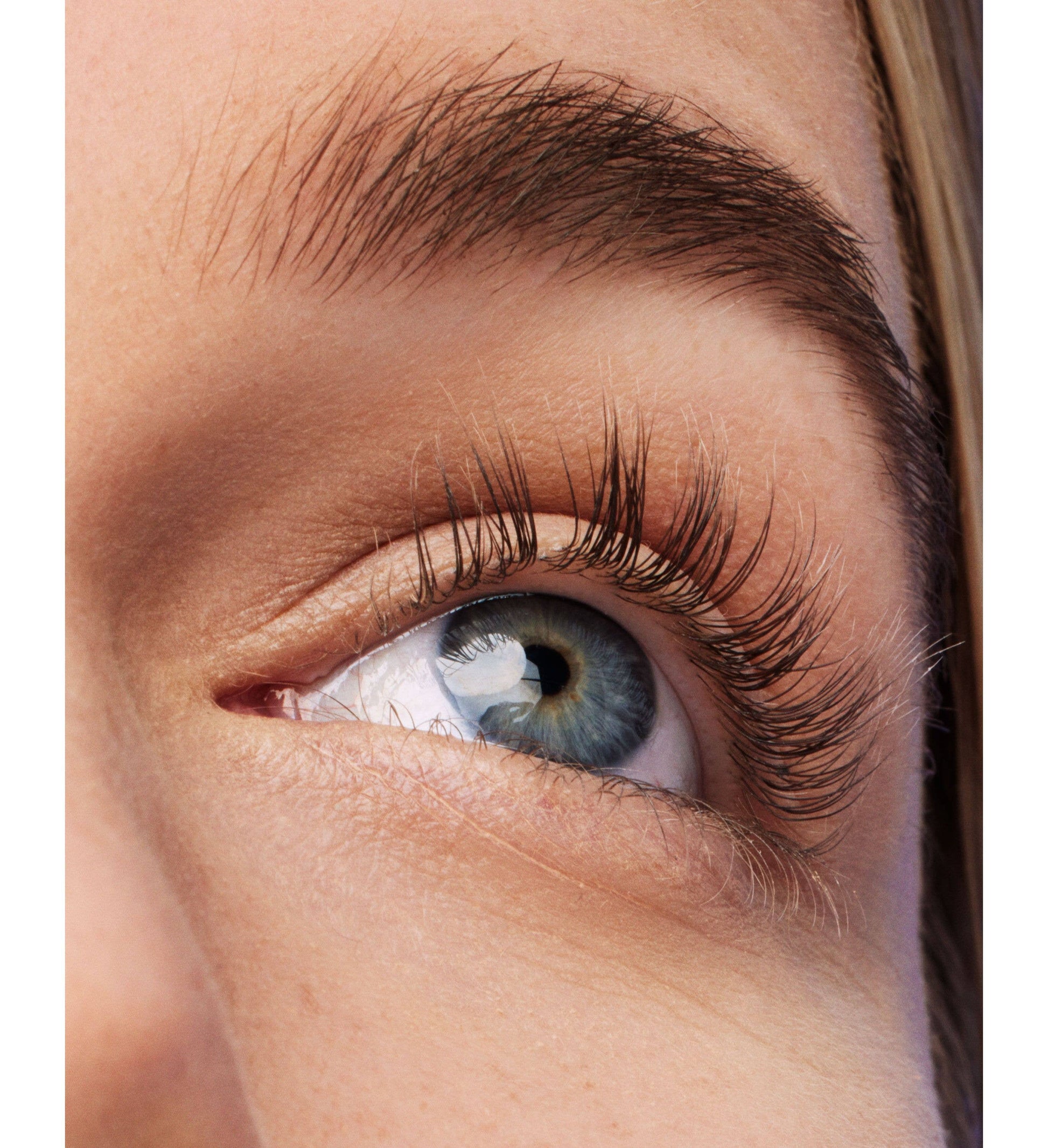 Babe Original Essential Lash Serum 2mL biotin-infused lash serum in blue and black packaging.
