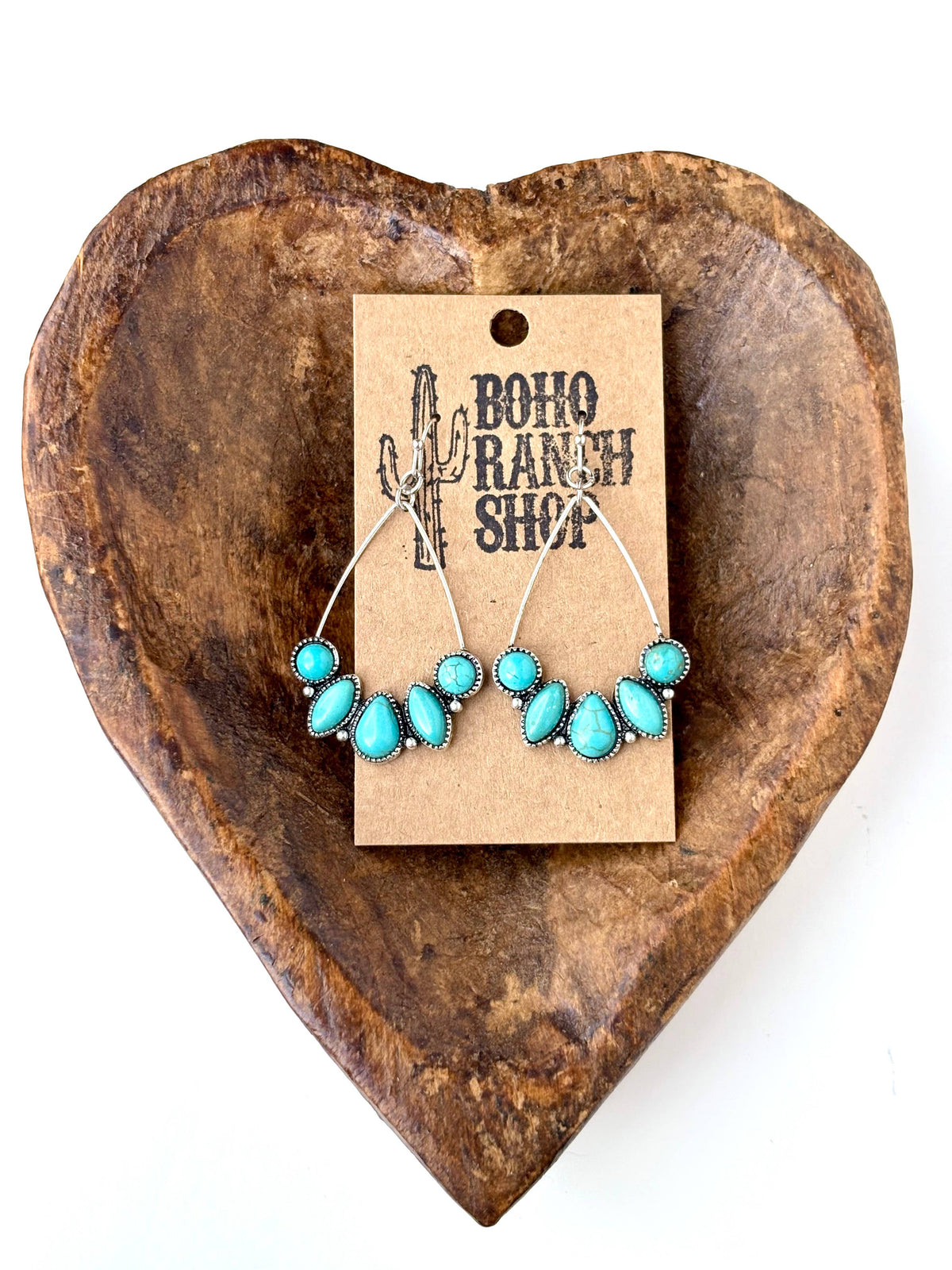 Turquoise teardrop hoop drop earrings with silver-tone western detailing and multiple turquoise-look stones