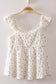 Blushing Prairie floral babydoll top available in blush and white with ruffle flutter sleeves and feminine tie-front neckline.