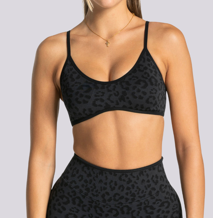 Black leopard print sports bra and high-rise biker shorts women's activewear outfit