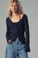 Black ribbed Midnight Muse Lace cardigan  styled for fall layering.
